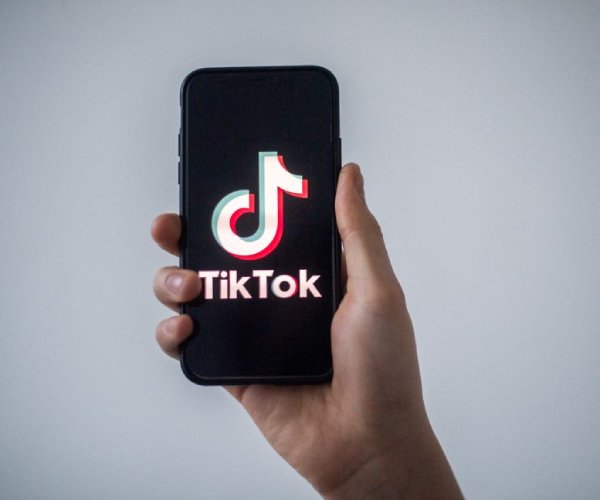 a smartphone displays the tiktok app