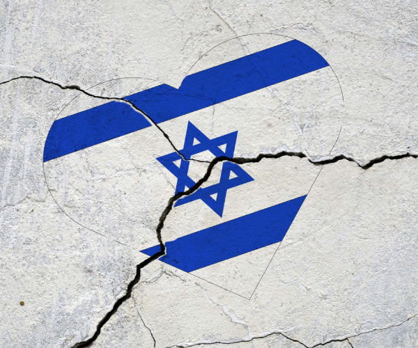 an israeli flag in a heart painted on cracked pavement or wall