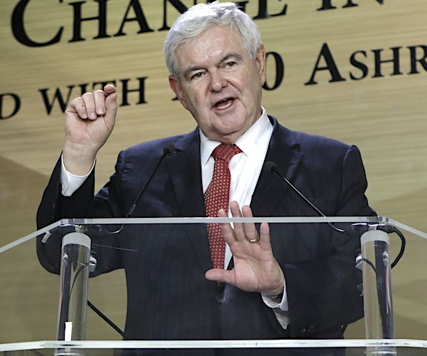 newt gingrich speaks from the lectern during a conference