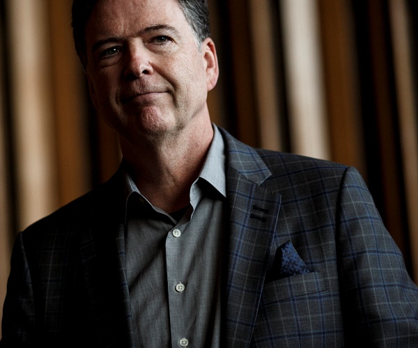 james comey stands backstage