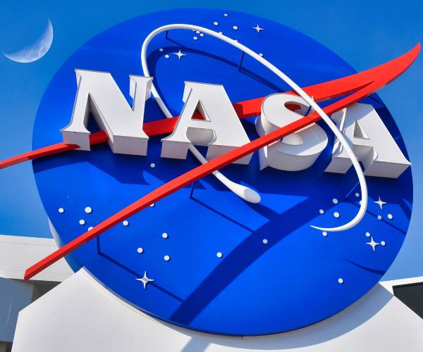 nasa logo outdoors withthe moon in the sky