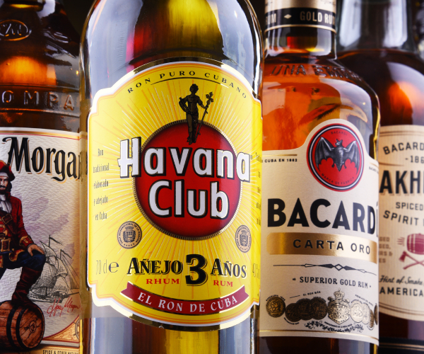 bottles of various brands of rum including bacardi and havana club