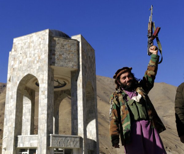 a taliban fighter revels