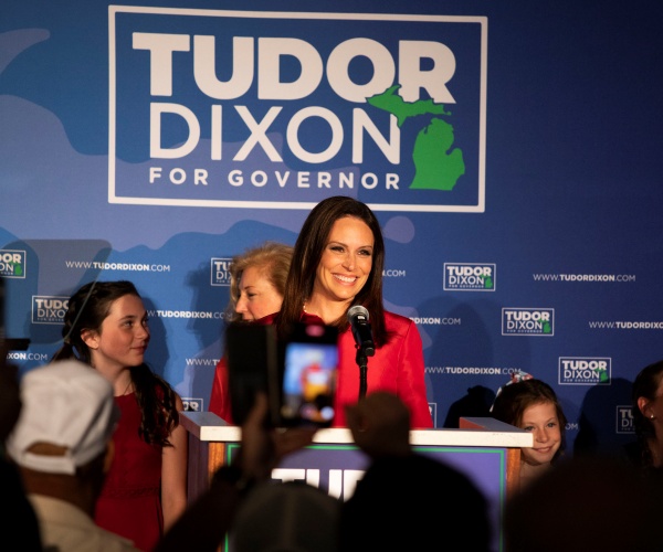 tudor dixon speaks at a rally