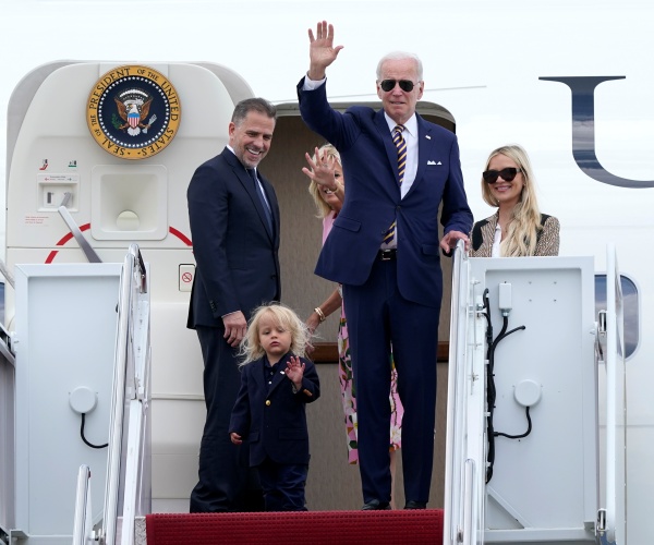 job biden and family waves from a plane