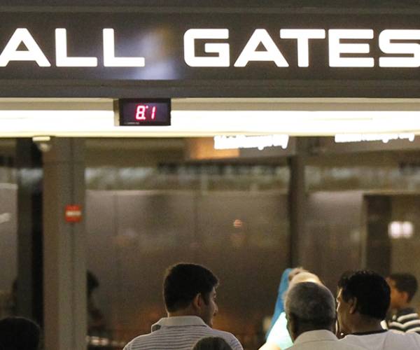 a sign in an airport reading all gates