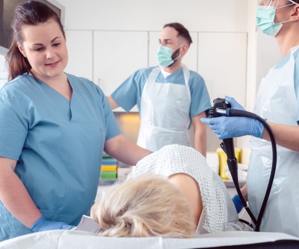 woman undergoing a colonoscopy