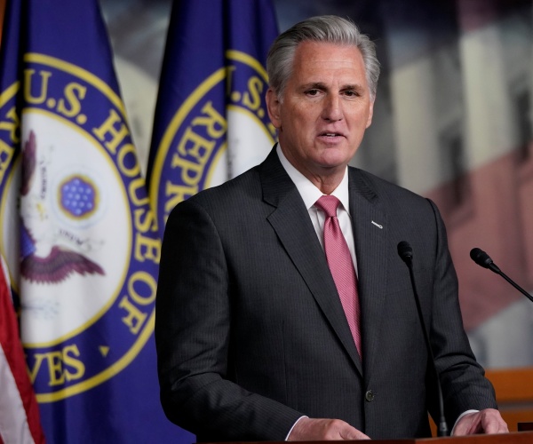 kevin mccarthy speaks into a microphone