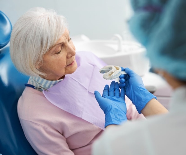 older woman in dentist's chair