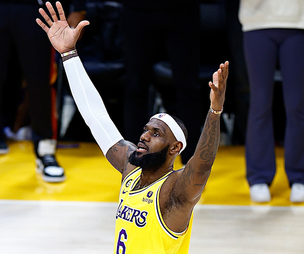 LeBron James exults as he becomes the NBA's all-time scoring leader, surpassing Kareem Abdul-Jabbar