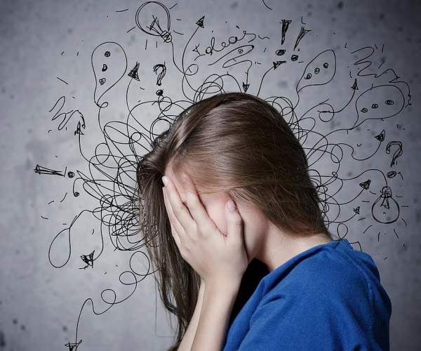 girl with head in hands