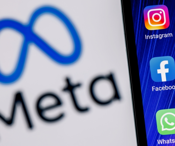 the meta logo seen on a smartphone
