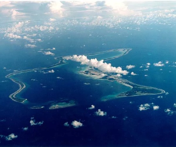 overseas strategically located island with military base aerial view 