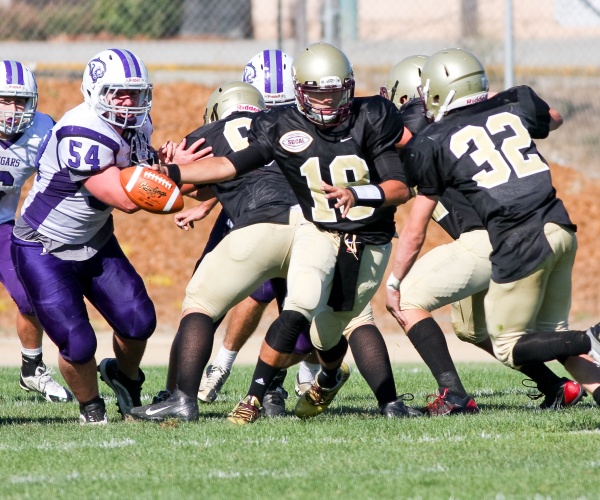 high school football players playing a game