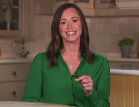 katie britt in her kitchen speaking to the camera