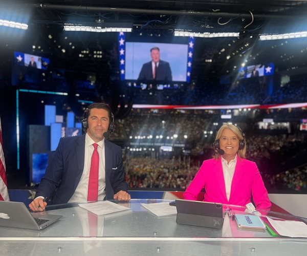 newsmax's rob schmitt, left, and greta van susteren