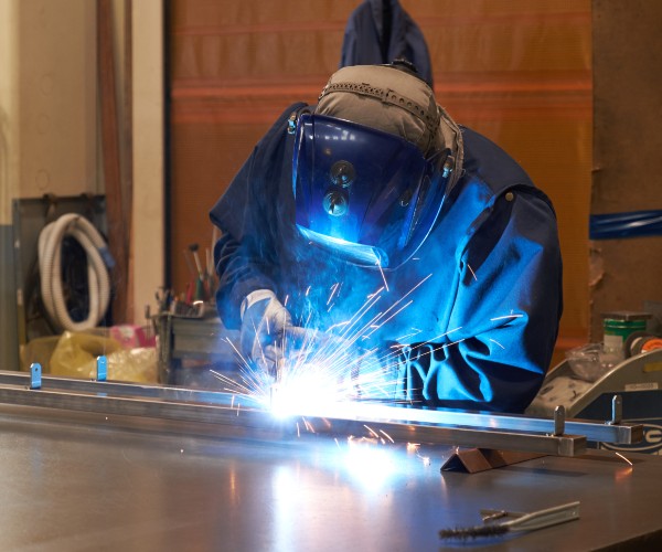 welder in a manufacturing plant in the land of the rising sun