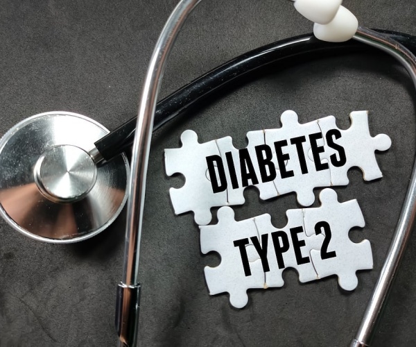 Diabetes Type 2 stamped on puzzle pieces