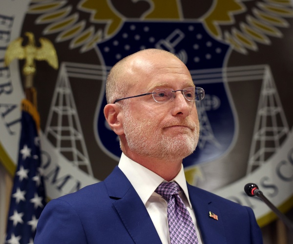 brendan carr speaks at news conference