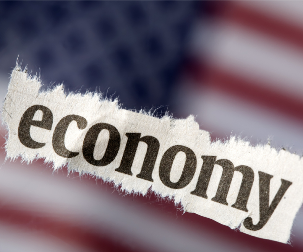 the word economy over an image of the american flag