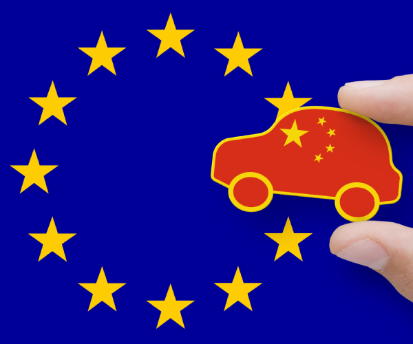 a european union flag with a car entering that has the emblem of the chinese flag