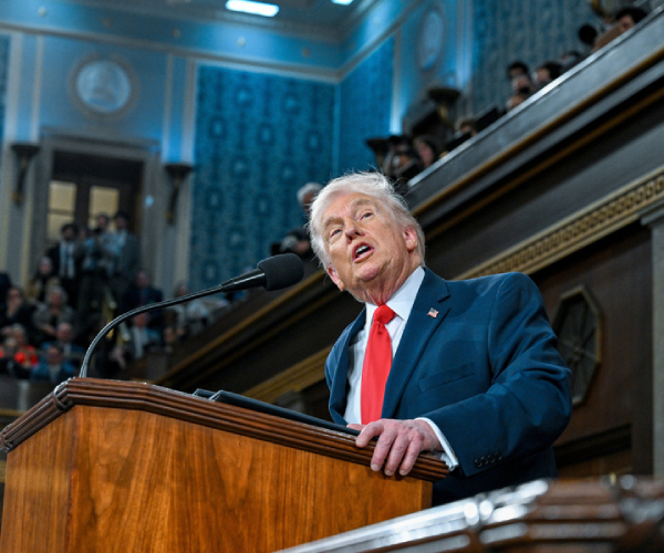 donald trump talks at a lectern in congress 