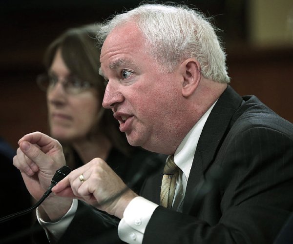 john eastman testifying during a house committee meeting