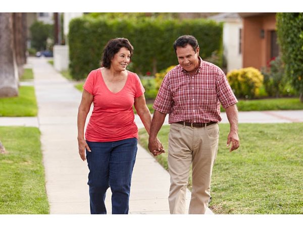 senior couple going for a walk outside