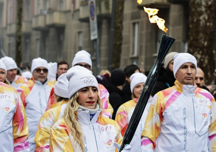 Olympic Torch Arrives in Milan to Cheers and Protests