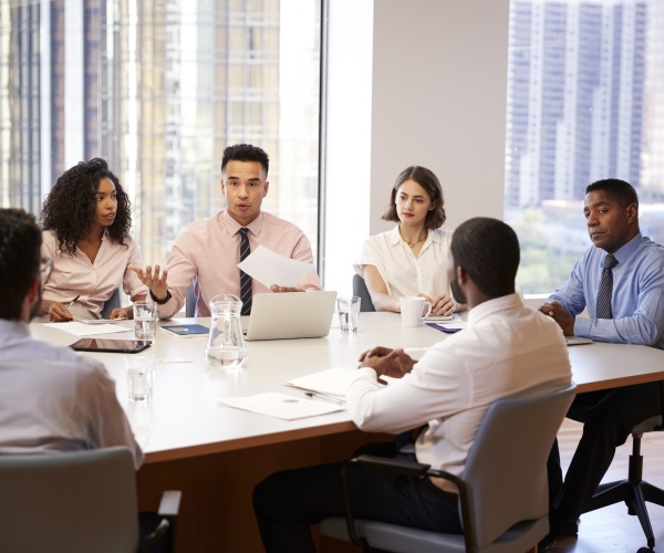 people in a meeting in office