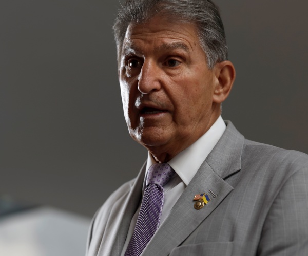 Manchin Denies That Deal Would Break Biden Promise on Raising Taxes