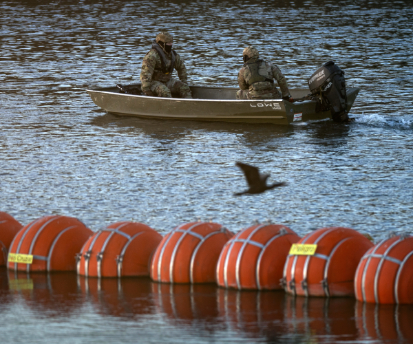 guard members in a boat 