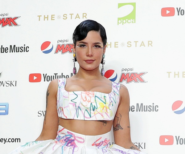 halsey stands on red carpet