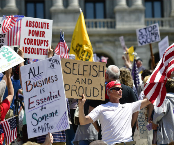 demonstrators at the pennsylvania state capitol protesting continued coronavirus closures 