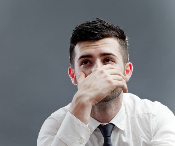 businessman looking anxious