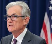 Fed Cuts Key Rate a Quarter-Point, Signals 2 More