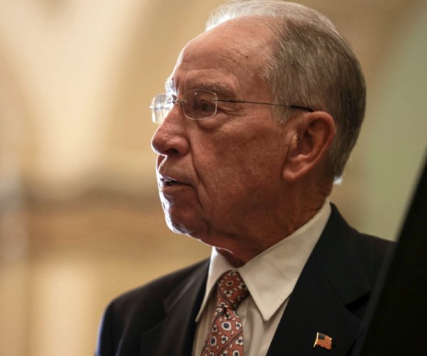 sen chuck grassley speaks with reporters before a vote