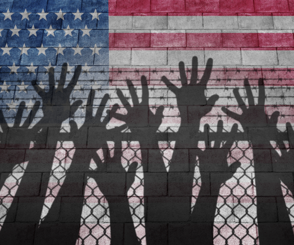 an illustration with hands reaching up, a fence, the us flag on a brick wall