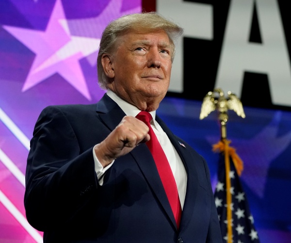 donald trump gestures while speaking