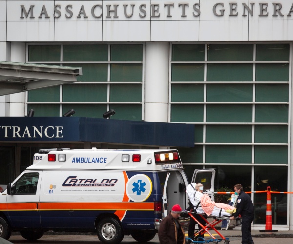 patient arriving at Massachusetts General Hospital where the pig kidney transplant took place. 