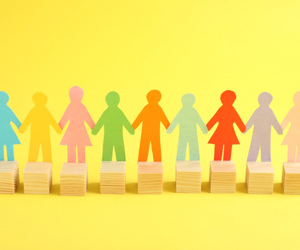 paper human figures with wooden cubes diversity and Inclusion concept
