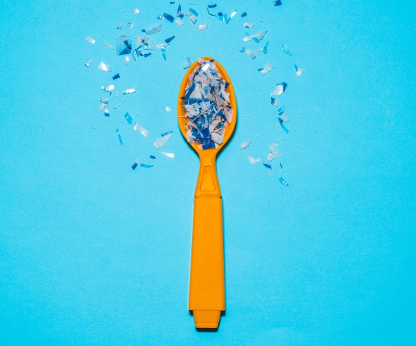 plastic spoon with microplastics on it