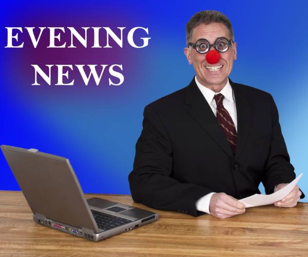 a newscaster wearing a red clown nose while he delivers the news