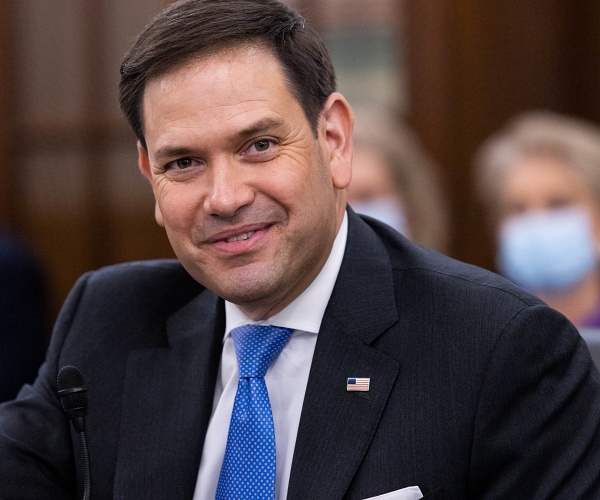 marco rubio smiles in hearing