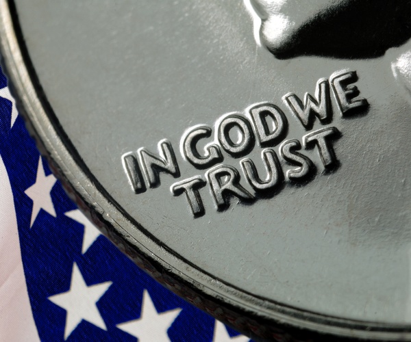 in god we trust with flag background