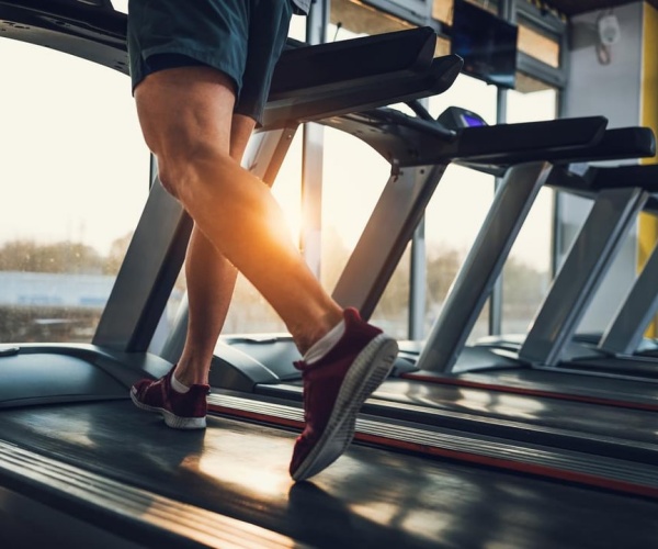 person running on treadmill