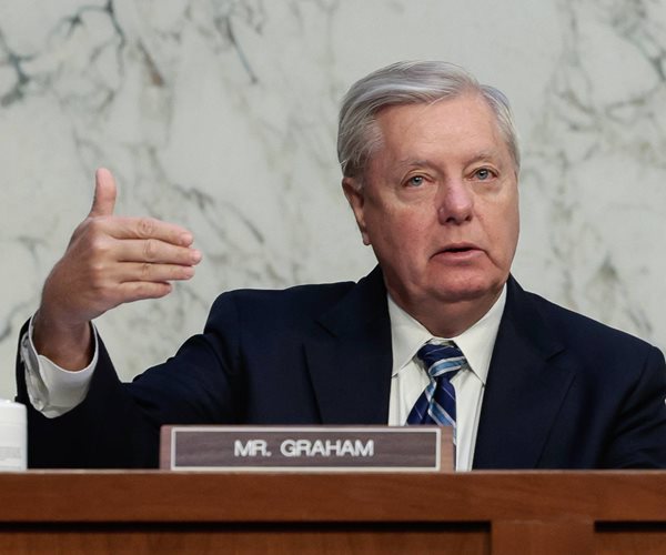 lindsey graham gestures while speaking