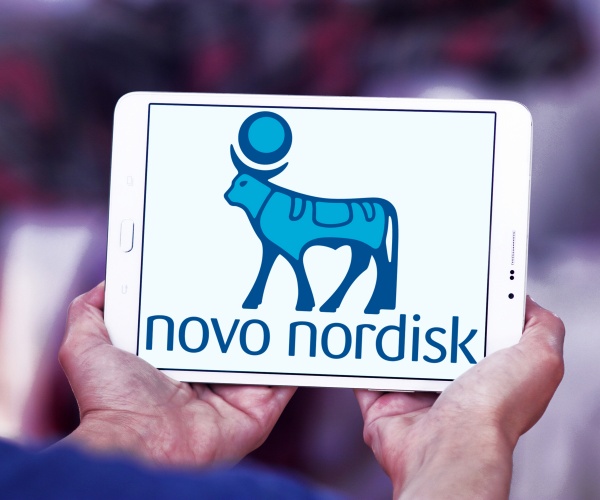 person holding a screen with Novo Nordisk 