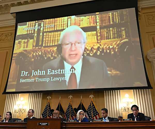 Dr. John Eastman appears on a video screen before the House Jan. 6 Select Committee