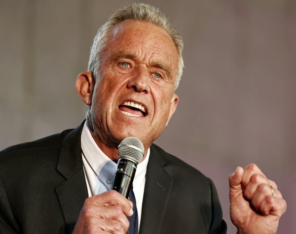 Robert F. Kennedy Jr speaking into a microphone